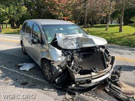 Heavy damage is evident to this minivan that struck a delivery truck on Route 896 in London Britain Township.