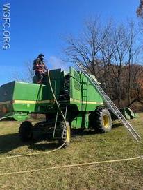 The engine compartment on this large combine caught fire, and is located atop this very large machine, with WGFC first responders putting out the blaze in London Grove Township.